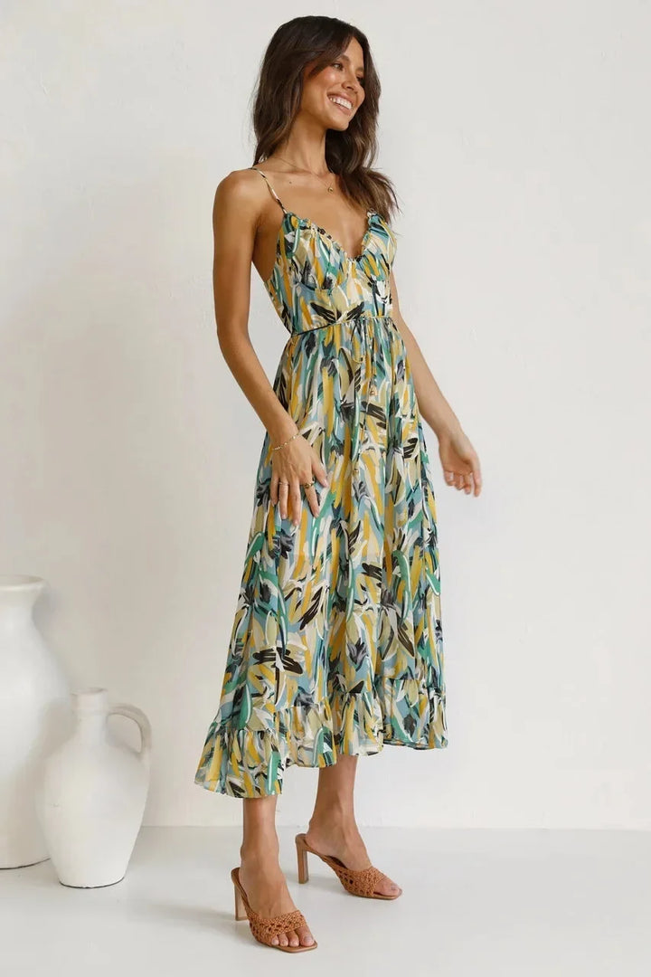 Versatile women's colorful abstract print v-neck sleeveless midi dress, suitable for elegant or casual summer wear.