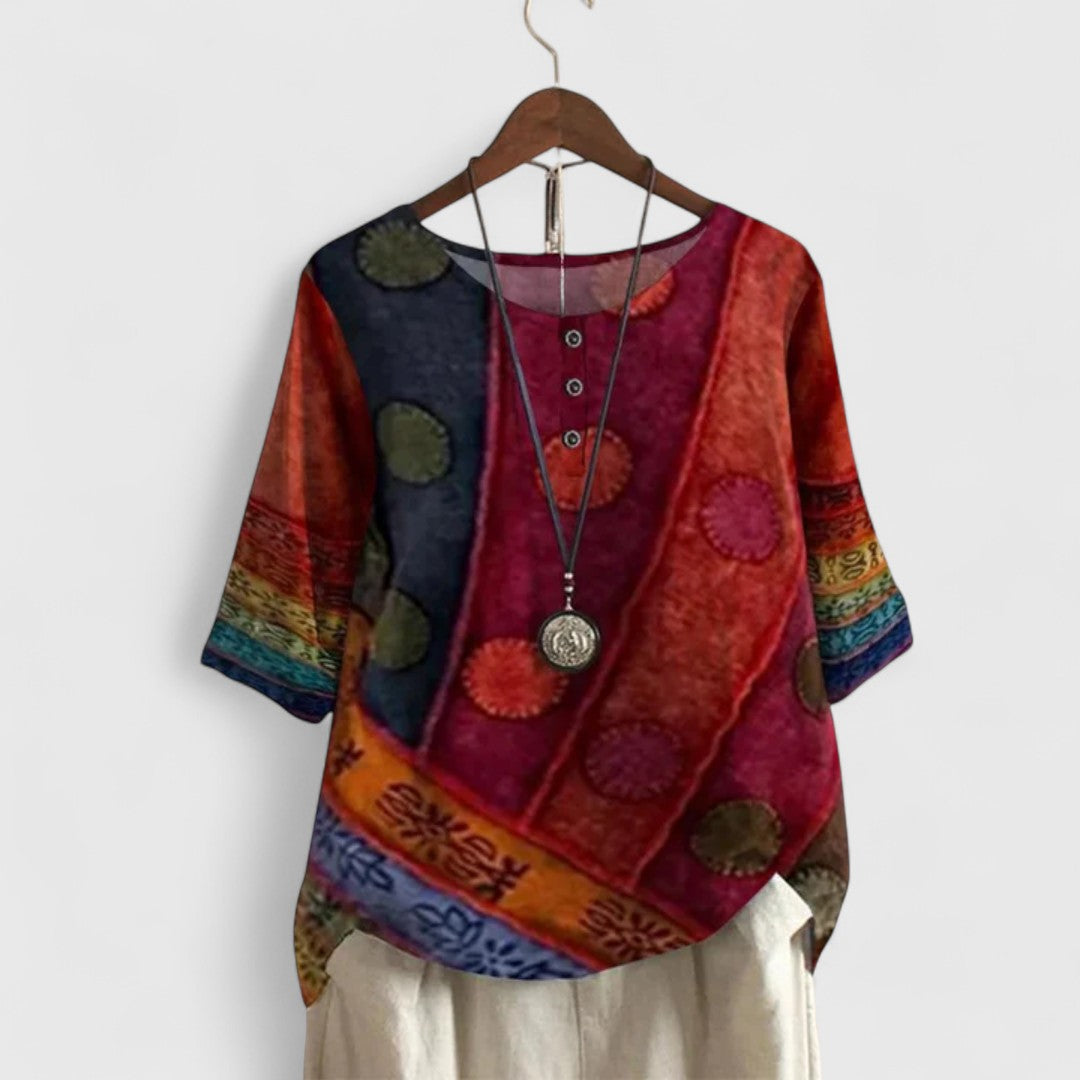 Vibrant women's boho patchwork long sleeve top, elegant for everyday wear. Relaxed fit for comfort and unique style.