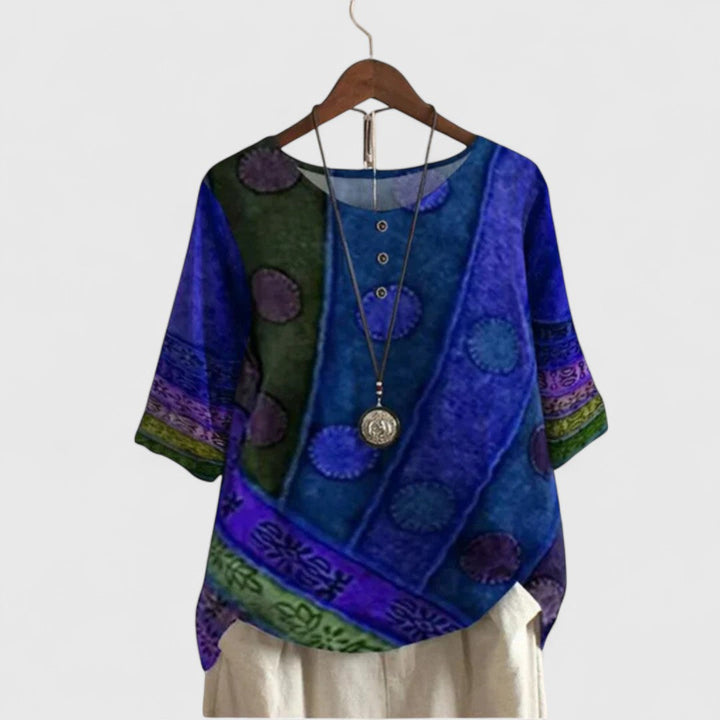 Vibrant women's long sleeve boho patchwork tunic, a comfortable and elegant top for casual wear and unique fashion.