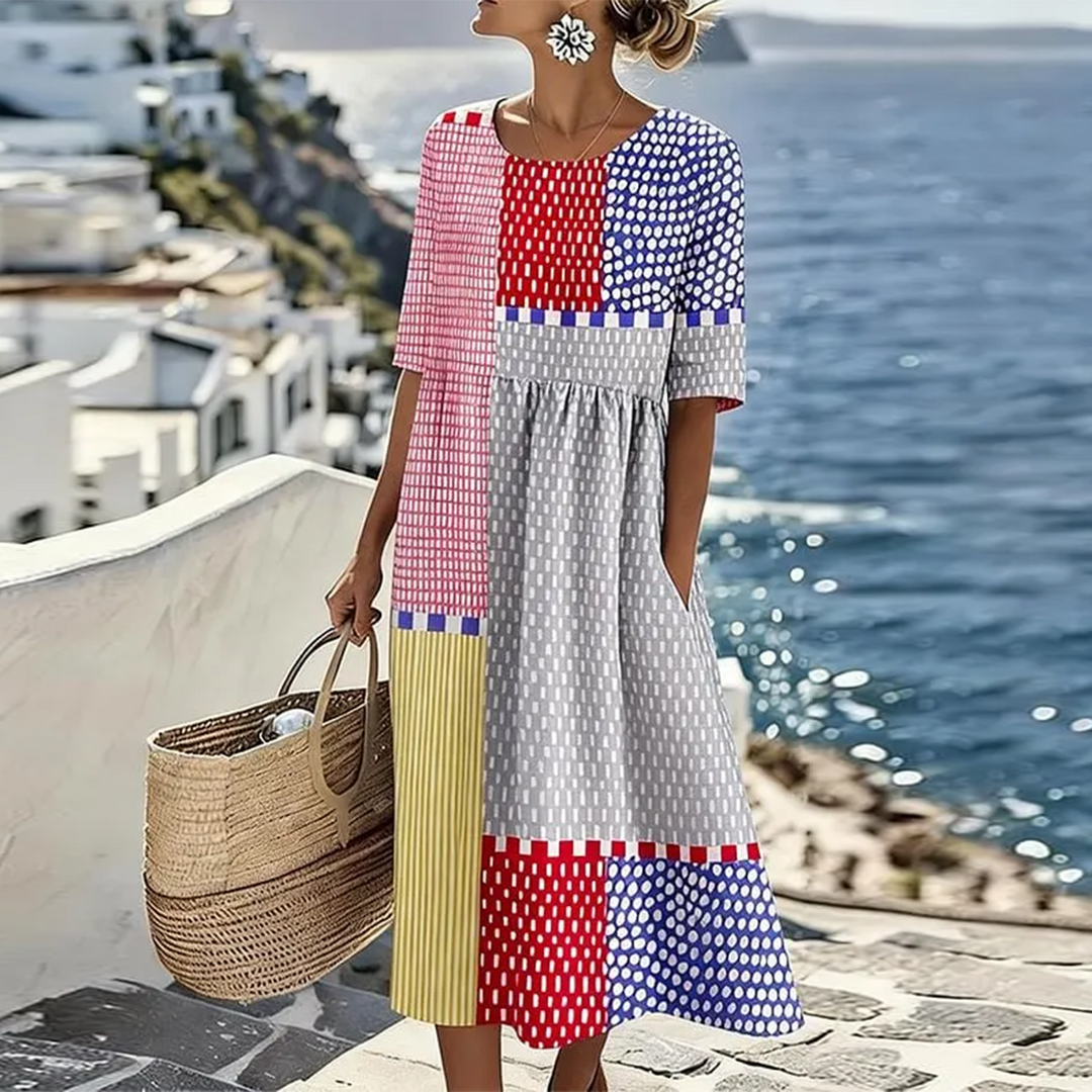 Vibrant women's color block geometric print midi dress with convenient pockets, perfect for casual summer fashion.