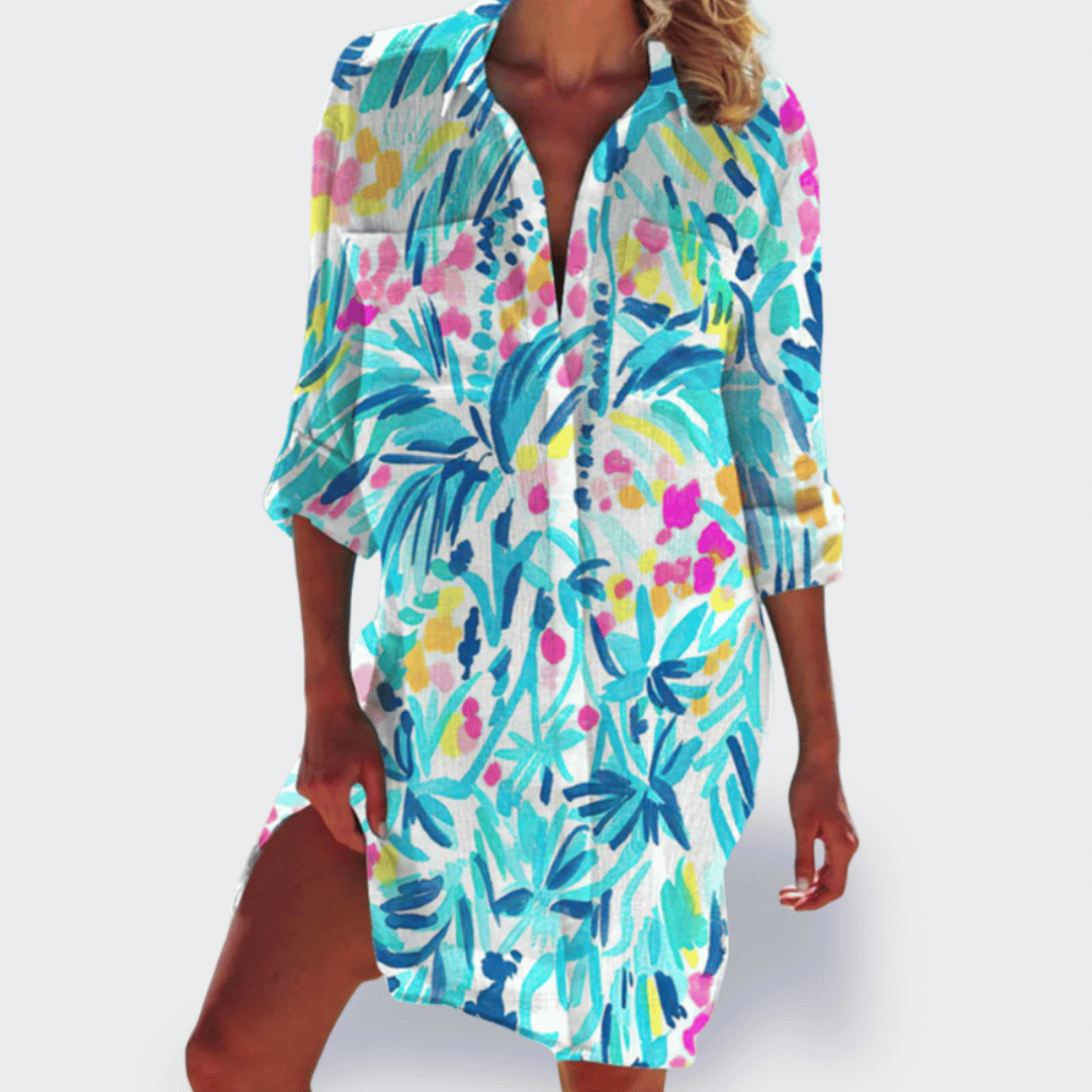 Flowy women's colourful summer dress, lightweight and comfortable, offering vibrant style for warm days.