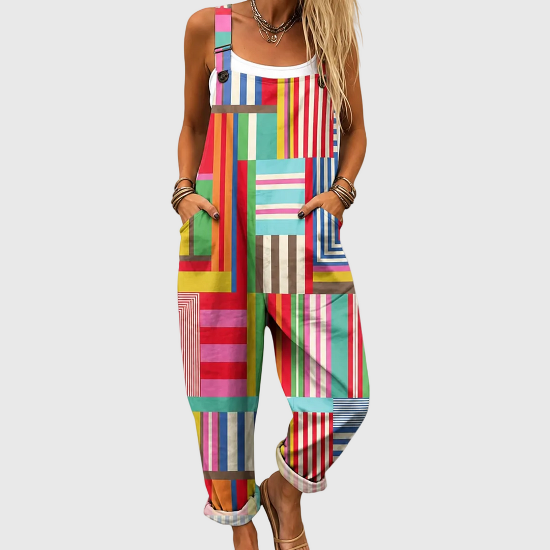 Vibrant women's patchwork overalls jumpsuit with a relaxed fit, colorful geometric patterns for casual comfort & unique style.