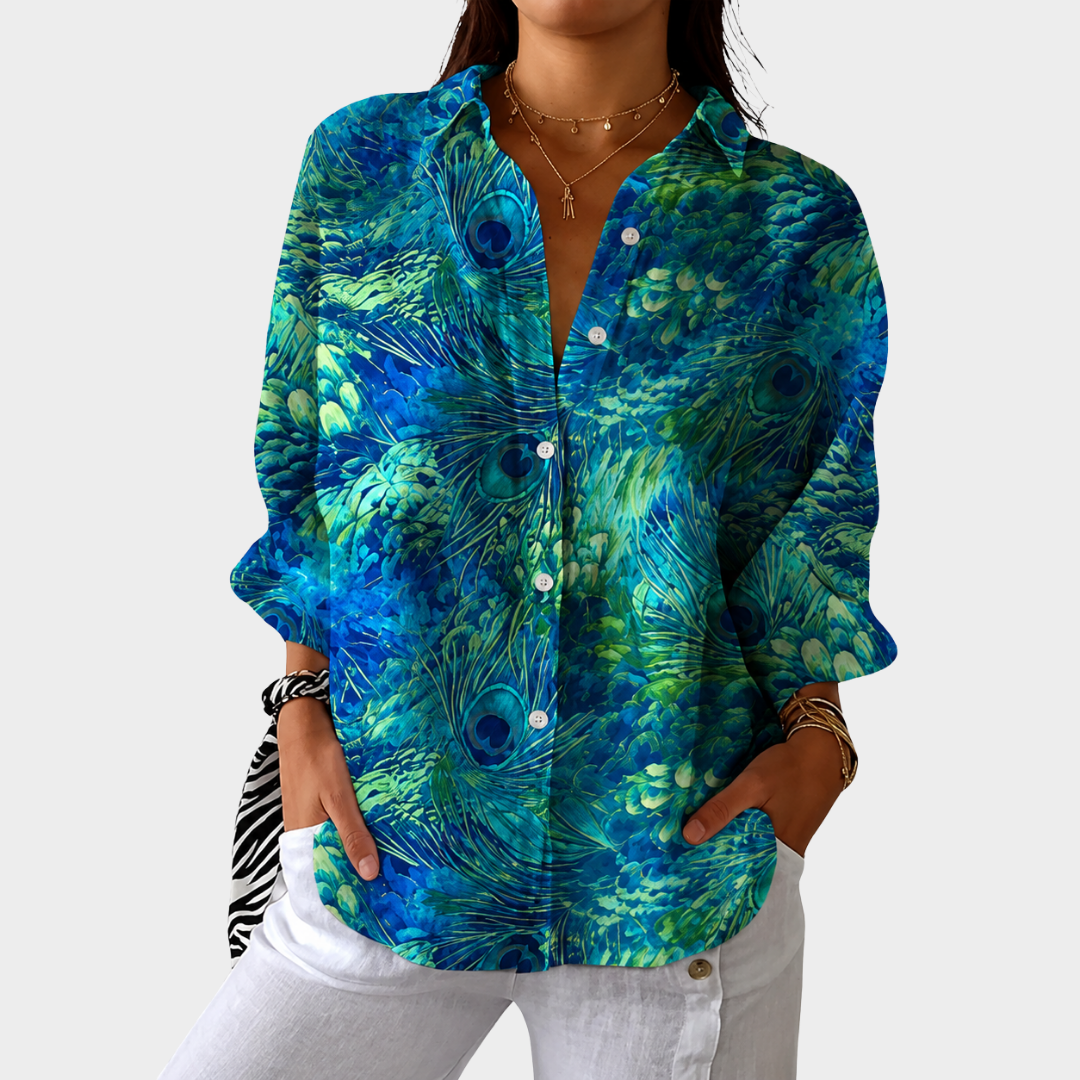 Vibrant women's printed blouse, lightweight & flowing. Colorful long-sleeve top with round neck for comfortable spring/summer style.