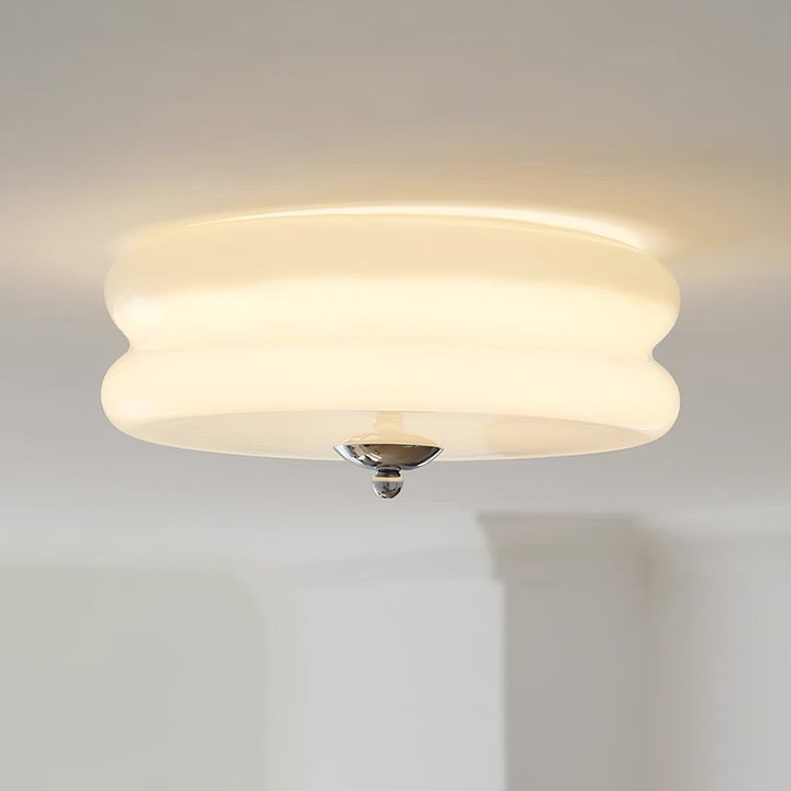 Art Deco fluted glass ceiling light, enhancing modern decor with ambient glow.