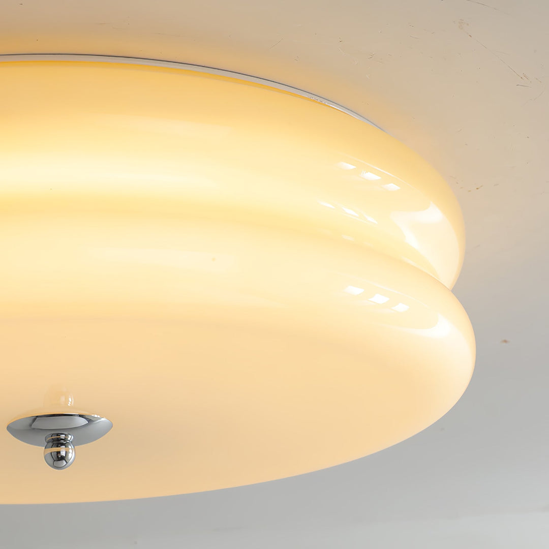 Elegant Art Deco fluted glass ceiling light, providing dimmable ambient illumination.