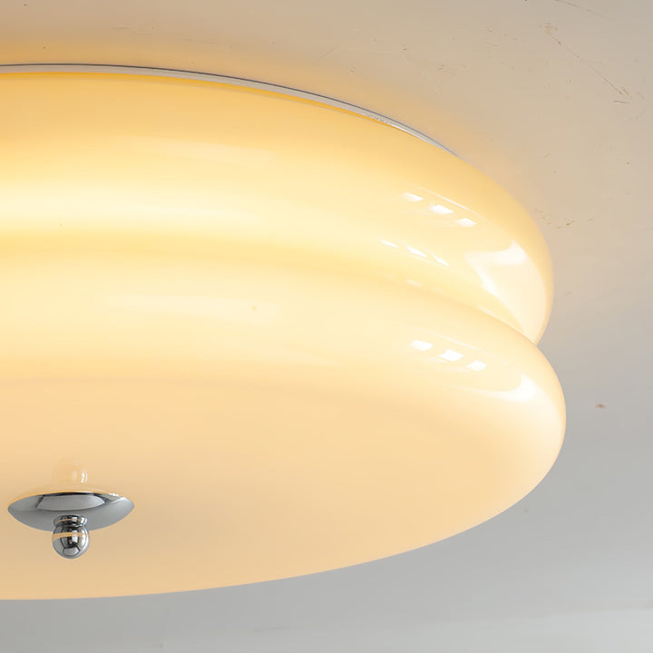 Elegant Art Deco fluted glass ceiling light, providing dimmable ambient illumination.
