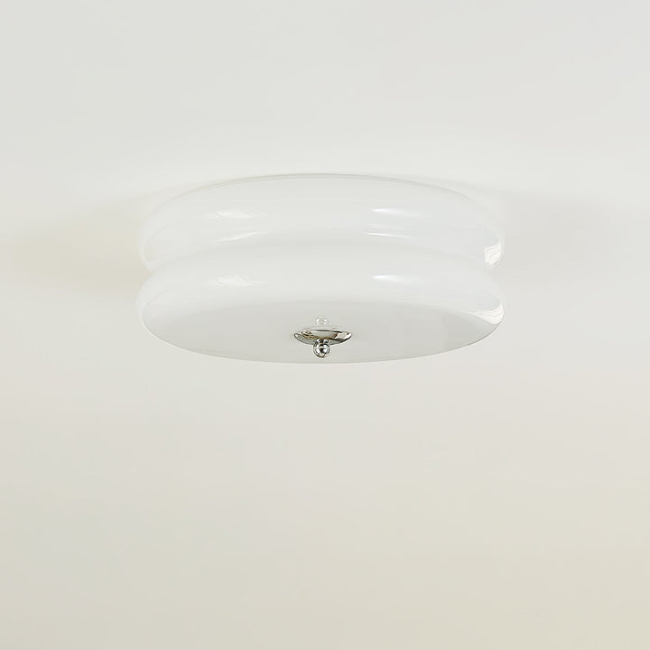 Art Deco style ceiling light with elegant fluted glass, enhancing any room's decor.