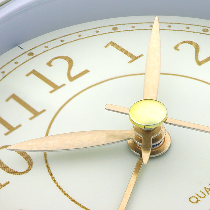 Vintage analogue clock in cyan with a soft night light for visibility