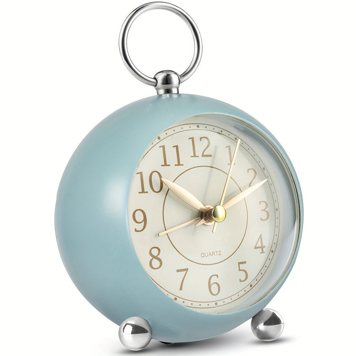 Retro silent alarm clock in cream, perfect for a bedside table
