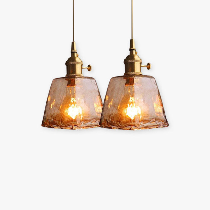 Vintage geometric pendant light with brass finish, ideal for modern living spaces.
