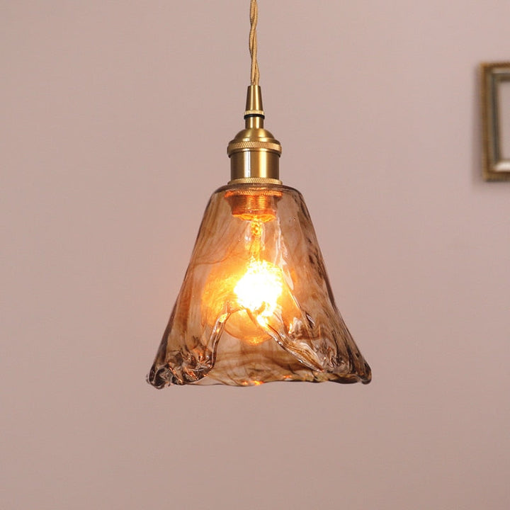 Vintage geometric ceiling lamp, brass finish, creates a warm modern ambiance in any room.