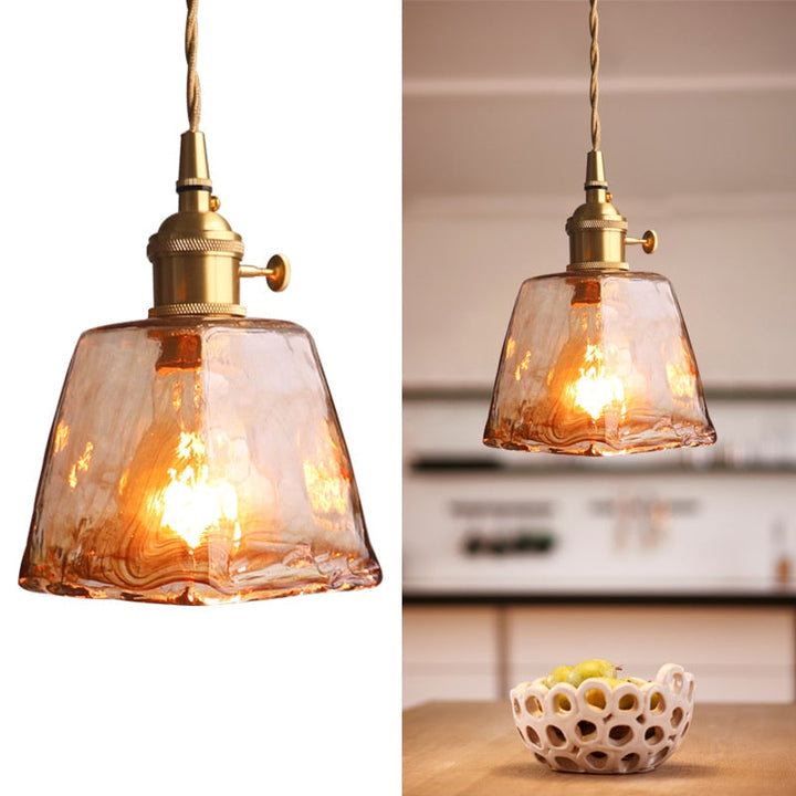 Brass finish geometric pendant light, vintage style, provides warm ambient lighting.