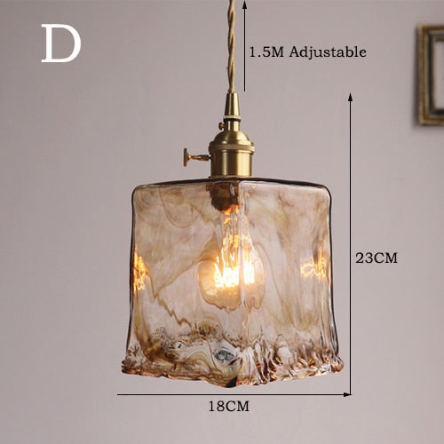 Intricate geometric brass pendant light, vintage design, emits a warm glow for modern homes.