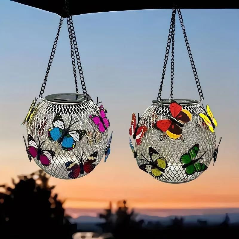 Durable solar hanging lantern, vintage LED, black metal cage, waterproof for all-weather garden lighting.