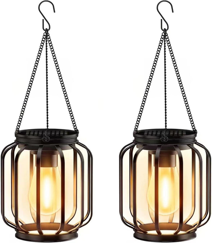 Outdoor solar light: vintage LED hanging lantern, metal cage design for garden pathway illumination.