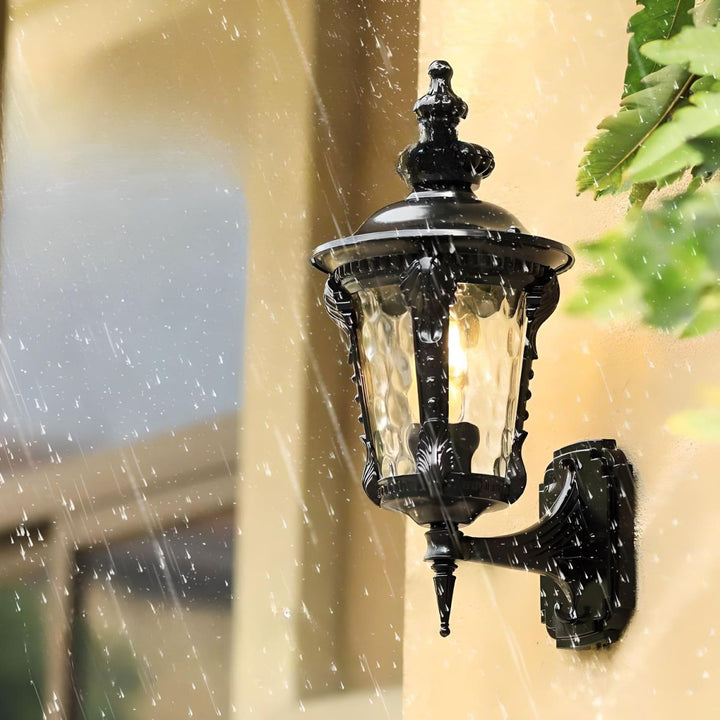 Timeless vintage outdoor wall light, hardwired, aluminum & glass design, enhances any outdoor space.