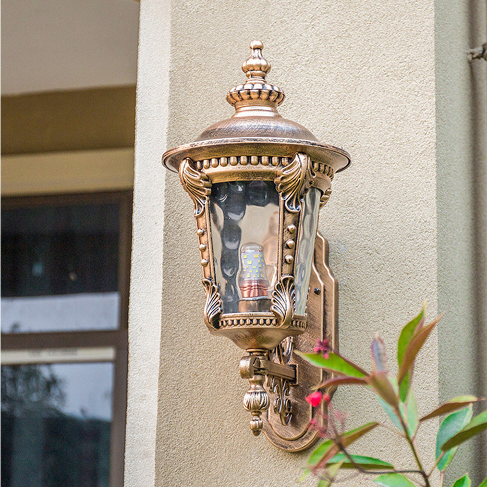 Hardwired vintage outdoor lantern in aluminum with classic glass shade, for elegant wall lighting.