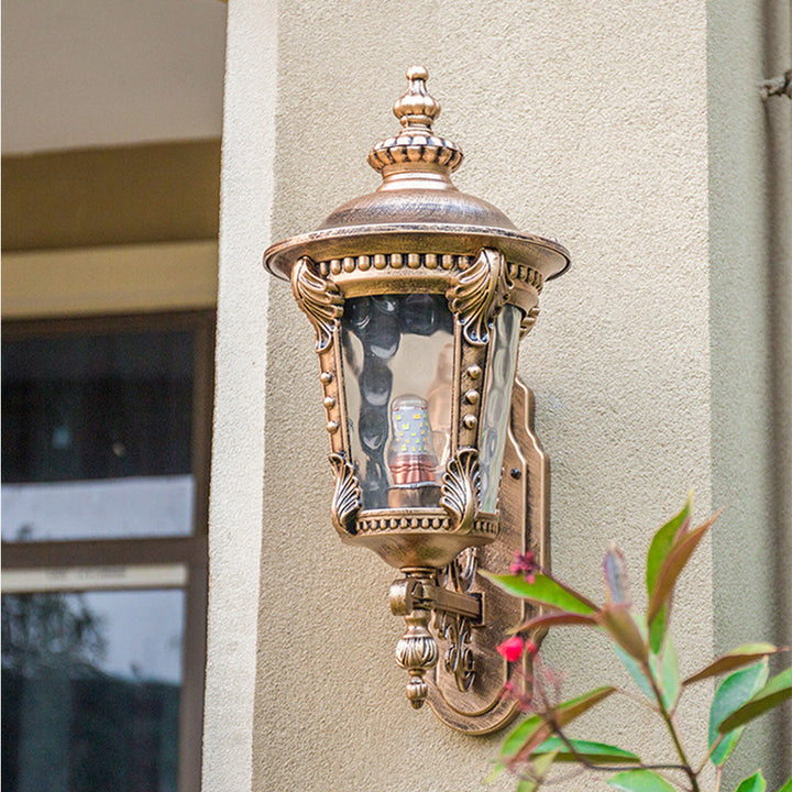 Hardwired vintage outdoor lantern in aluminum with classic glass shade, for elegant wall lighting.