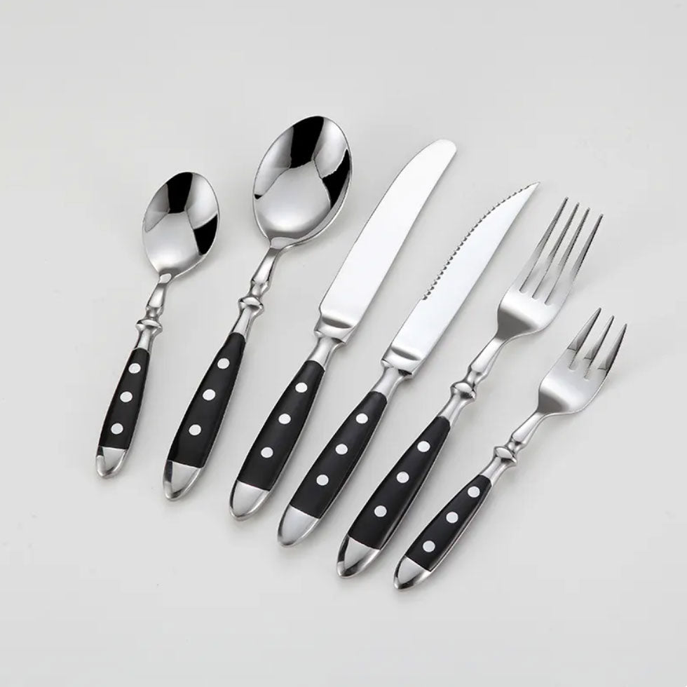 Durable vintage stainless steel flatware set, perfect dining utensils with ergonomic resin handles.