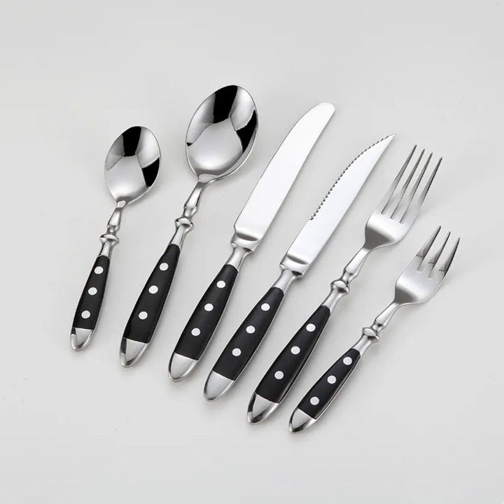 Durable vintage stainless steel flatware set, perfect dining utensils with ergonomic resin handles.