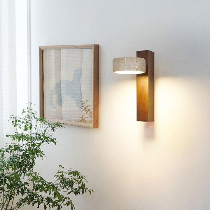 Abstract Wabi Sabi style LED wall lamp, combining natural travertine and wood for unique ambient light.