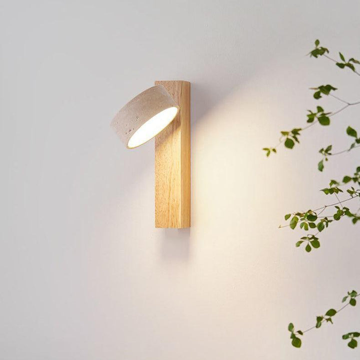 Minimalist LED wall lamp with travertine and wood, Wabi Sabi design for serene bedroom or living room light.