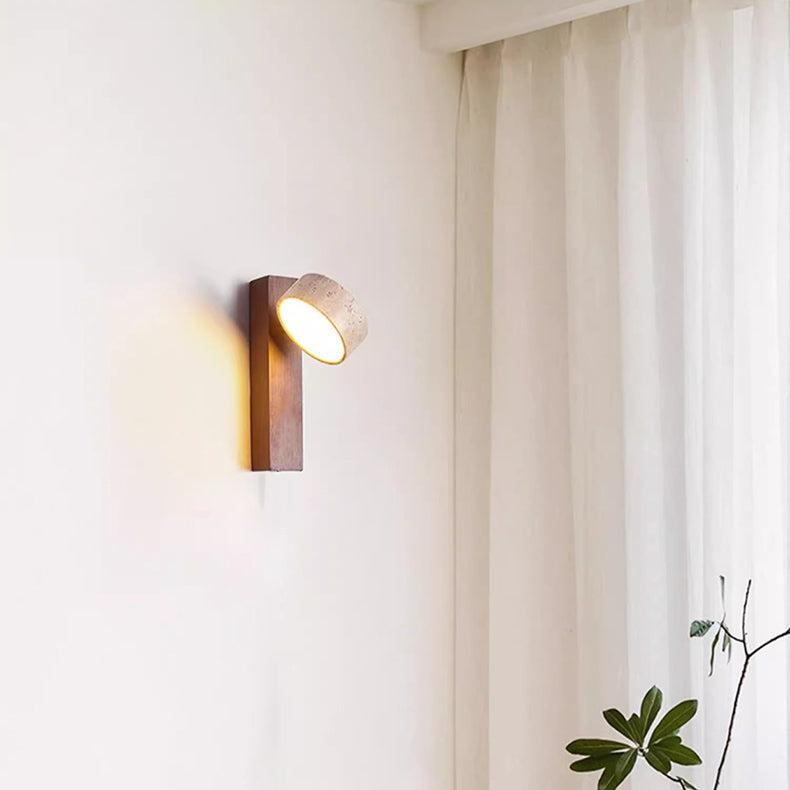 Modern LED wall lamp featuring wabi sabi natural wood and travertine. Ideal ambient light for contemporary homes.