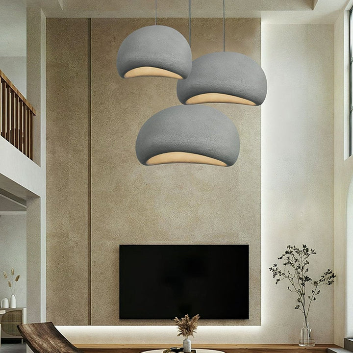 Modern Wasabi pendant fixture, featuring an adjustable sculpted dome.