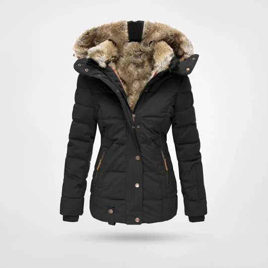 Water-resistant insulated winter jacket for women in navy blue, offering warmth and style.
