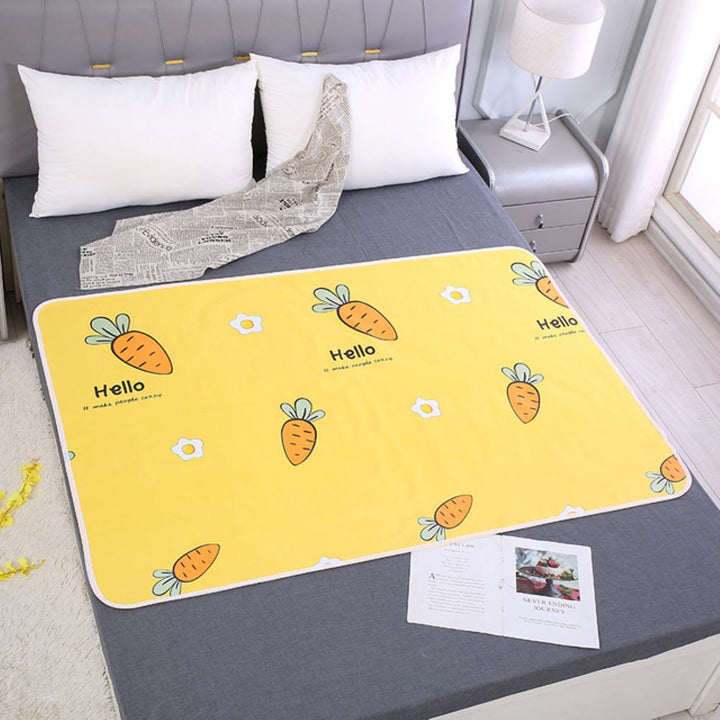 Cartoon baby changing pad, hygienic and comfortable for newborns.