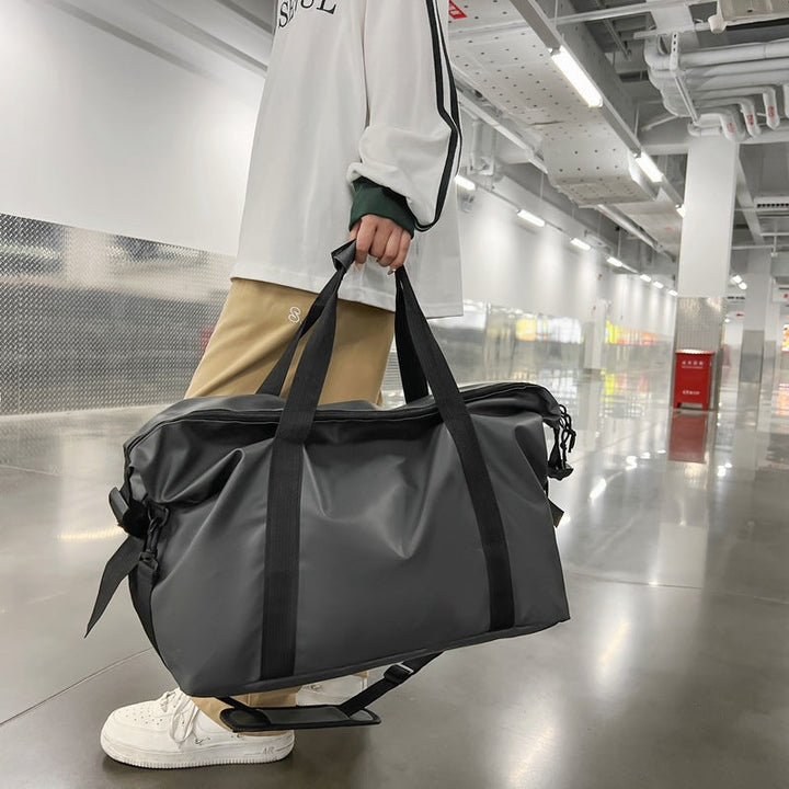 Waterproof outdoor duffel bag for adventure travel & sports gear. Durable unisex luggage, perfect for wet conditions.