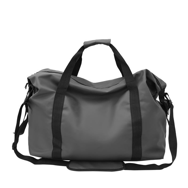 Unisex waterproof duffel bag with sturdy handles, perfect for travel, gym, or outdoor activities. Durable adventure gear.