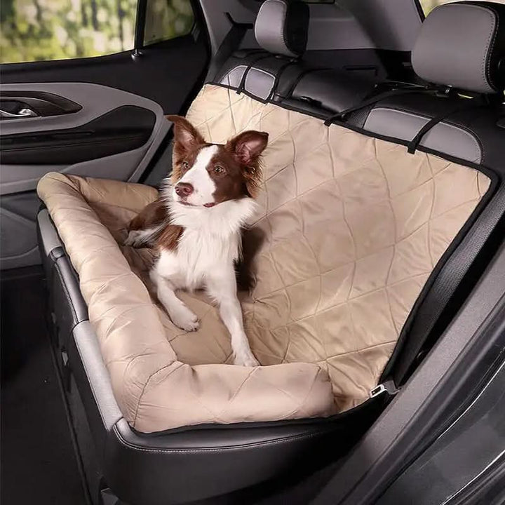 Waterproof rear car seat cover for dogs, featuring anti-slip & quilted pattern for pet travel & car protection.