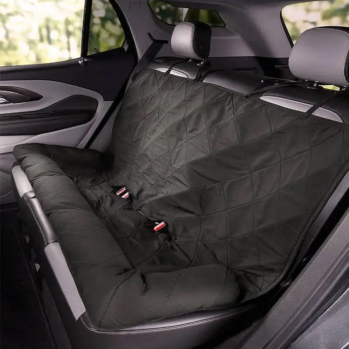 Quilted waterproof anti-slip rear pet car seat cover, ensuring clean, safe dog travel & vehicle interior protection.