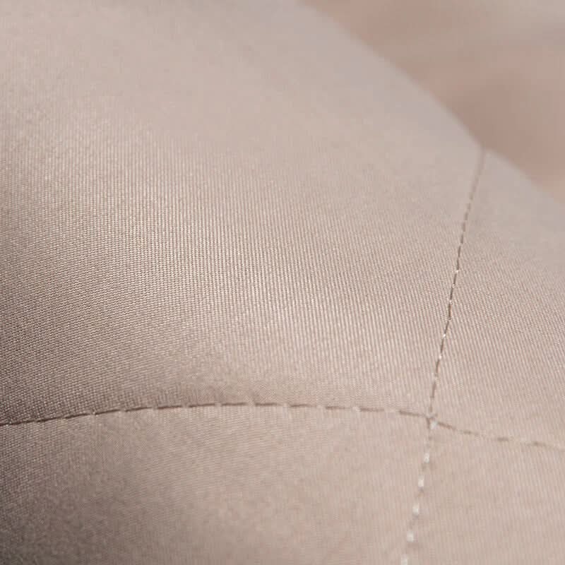 Comfortable, quilted anti-slip dog seat cover for rear car seats. Waterproof protection for easy pet travel cleanup.