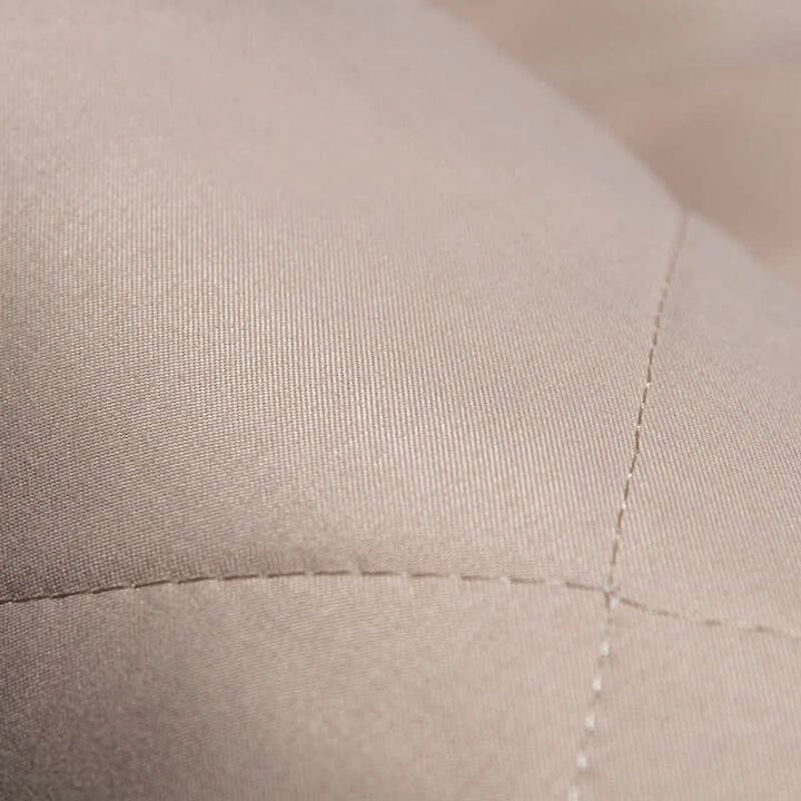 Comfortable, quilted anti-slip dog seat cover for rear car seats. Waterproof protection for easy pet travel cleanup.