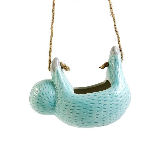 Cute sloth ceramic hanging planter, a whimsical decorative pot for succulents & home decor. Animal themed.