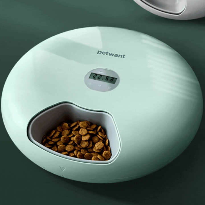 Sleek white automatic pet food dispenser, a modern digital feeder for precise dog & cat meal times.