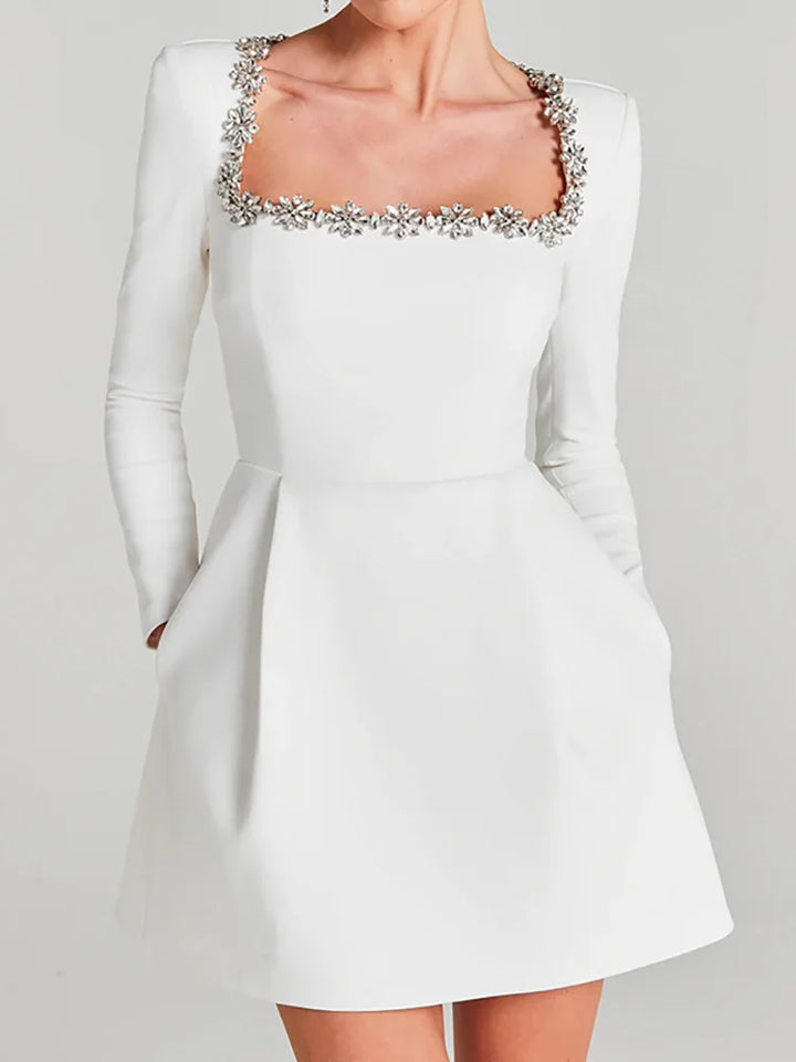 White elegant mini wedding dress for women, featuring a square neckline and long sleeves.
