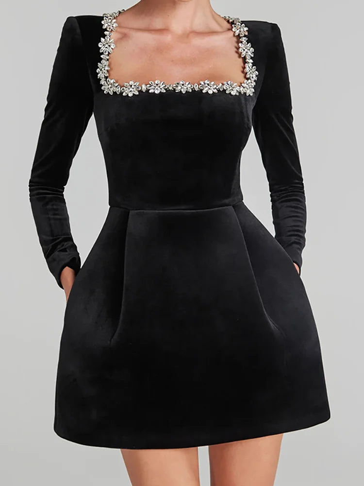 Women's chic white mini party dress, long sleeve, square neckline, ideal for celebrations.
