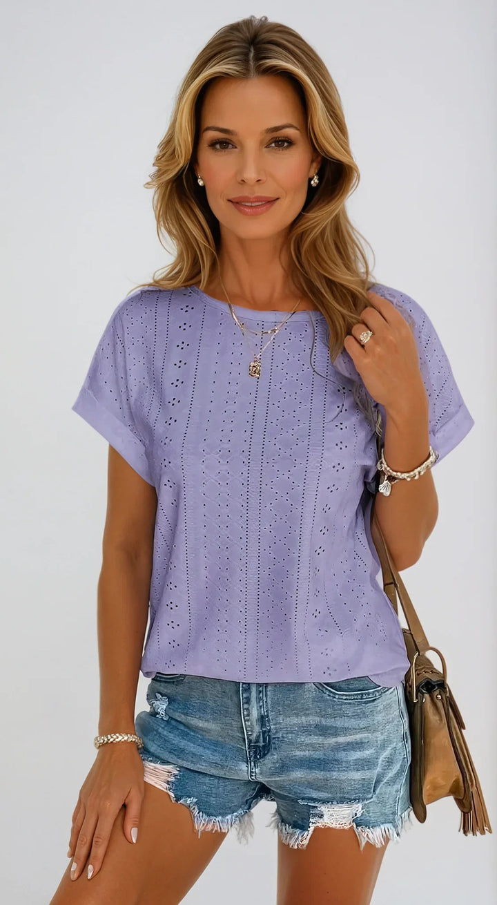 White eyelet short-sleeve women's top. Classic crew neck & cuffed sleeves for an elegant, relaxed fit.