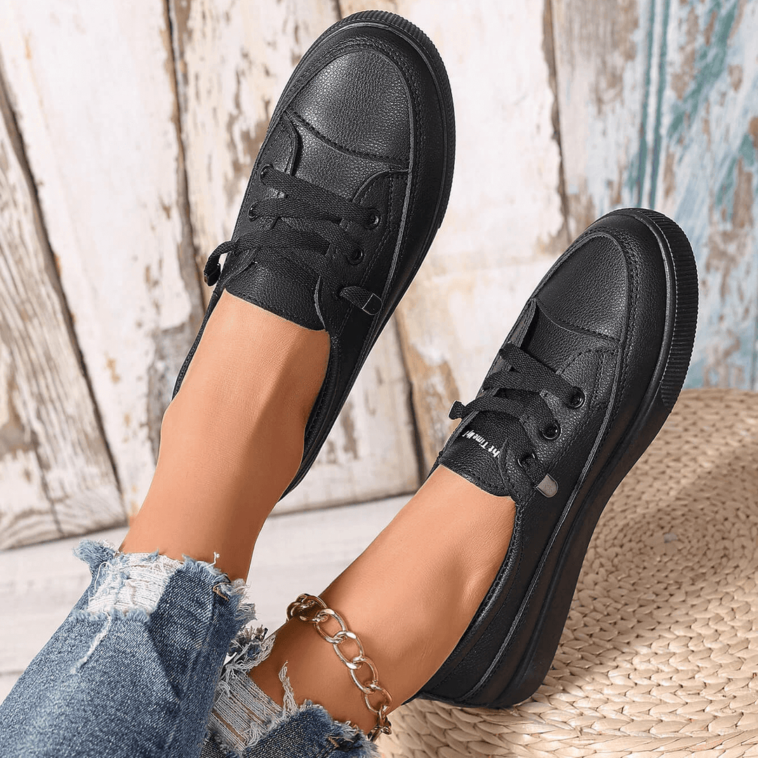 Active women's white lace-up orthopaedic sneakers for comfortable walking & support.