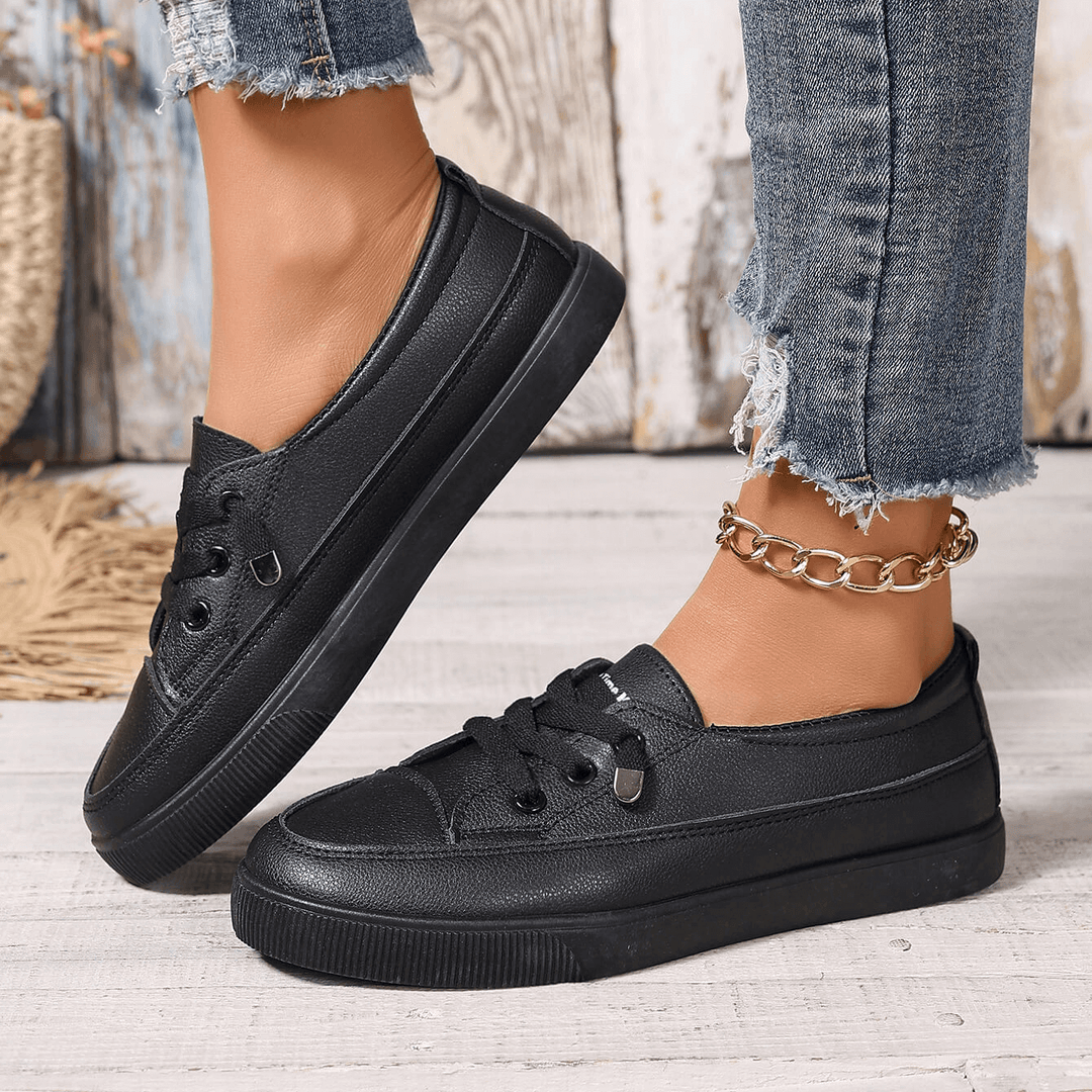 Orthopaedic white lace-up trainers for women, providing all-day comfort & pain relief.