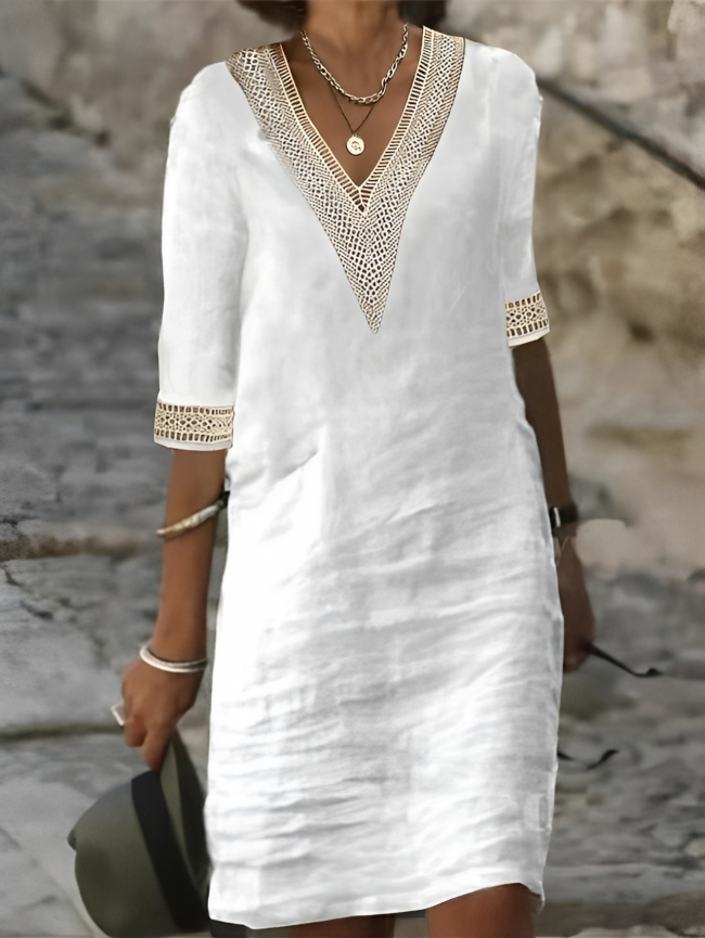 White women's comfortable casual midi dress, perfect for everyday wear and versatile spring or summer fashion.