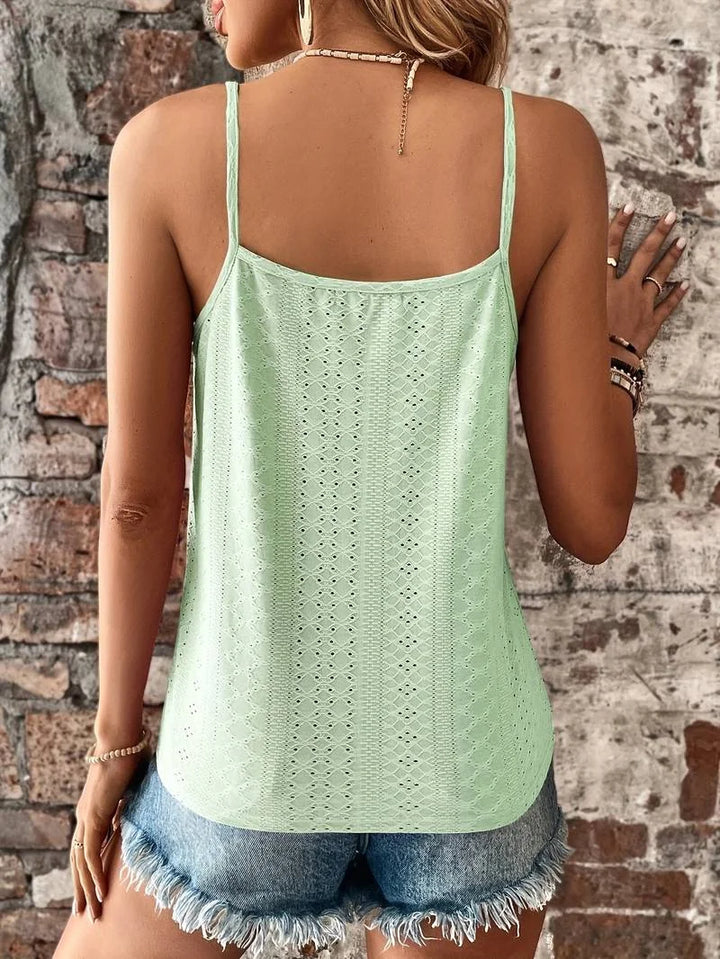 Women's white embroidered camisole top, eyelet design, V-neck & delicate lace trim.