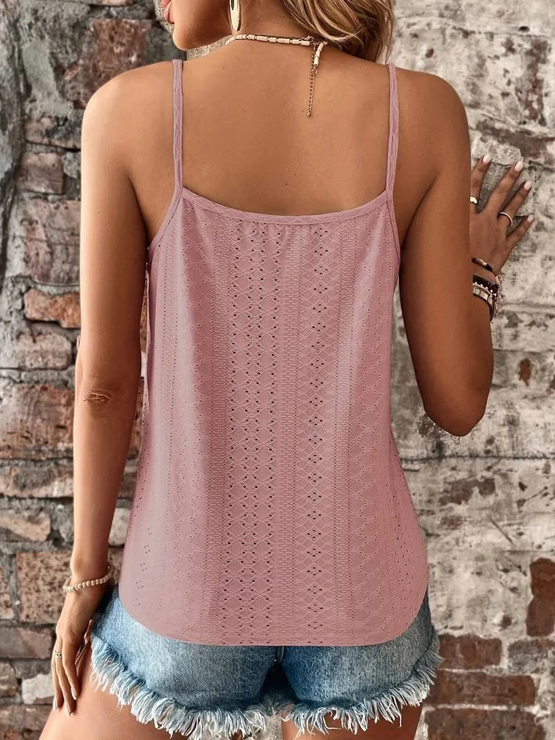 Women's V-neck cami: white eyelet fabric, intricate embroidery, and delicate lace trim detail.