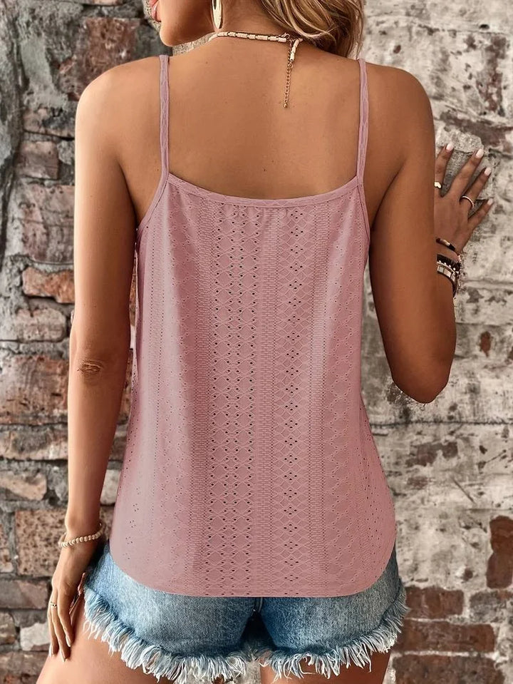 Women's V-neck cami: white eyelet fabric, intricate embroidery, and delicate lace trim detail.