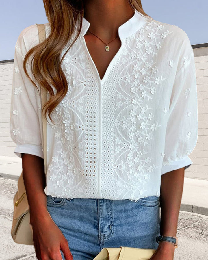 Feminine white V-neck puff sleeve top for women, offering versatile casual elegant summer fashion.