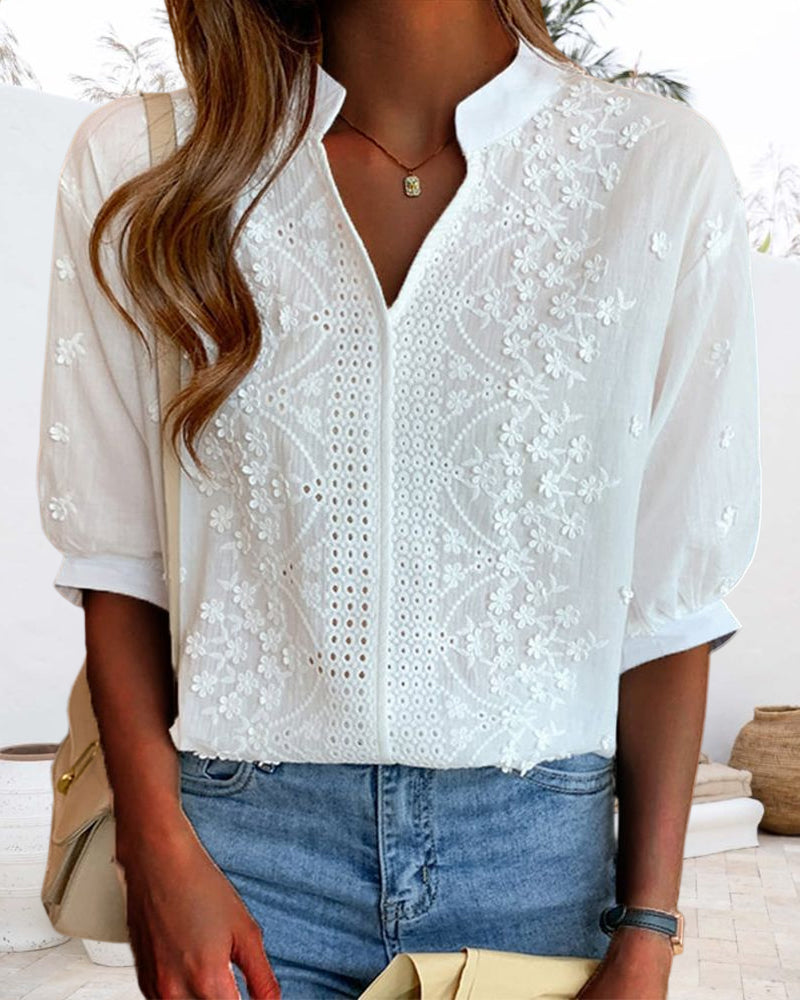 Daytime chic white V-neck puff sleeve blouse, perfect for women's stylish summer outfits.