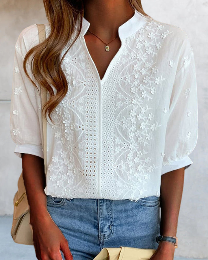 Effortless summer style with this white women's V-neck puff sleeve blouse, perfect for casual elegance.
